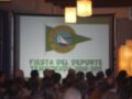 Fiesta del Deporte Temporada 2010-2011 en el Club Náutico Sevilla, con un gran escenario proyectando el logo del club y el nombre de la fiesta.