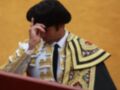 Un torero se prepara para la corrida de toros, con su traje tradicional y sombrero típico.