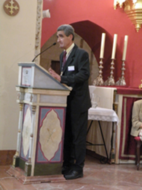 Provincia.El Profesor e Historiador D. Manuel Morales Morales, pronuncio una disertación, sobre el canto de la Sentencia de Pilatos en la Hermandad de Jesús Nazareno de Alcalá del Río.