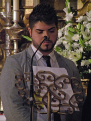 Provincia.El Profesor e Historiador D. Manuel Morales Morales, pronuncio una disertación, sobre el canto de la Sentencia de Pilatos en la Hermandad de Jesús Nazareno de Alcalá del Río.