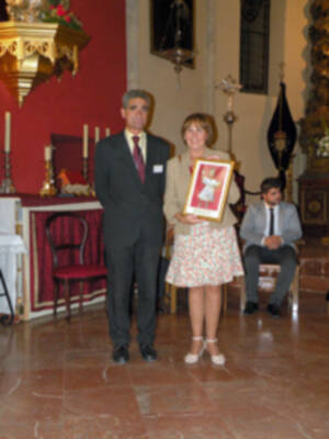 Provincia.El Profesor e Historiador D. Manuel Morales Morales, pronuncio una disertación, sobre el canto de la Sentencia de Pilatos en la Hermandad de Jesús Nazareno de Alcalá del Río.