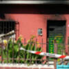 Efectivos del Consorcio de Bomberos extinguen un incendio que deja calcinada una vivienda en la calle Naranjo(Chipiona)