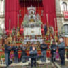 Balcones y altares en la procesión del Corpus sevillano.
