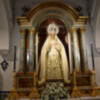 Dolorosa vestida de blanco en tiempo estival.
