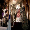 Altar, exposición y acto en la corporación de Miércoles Santo de Alcalá del Río.