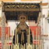 La Hermandad de la Soledad de Alcalá del Río, mantiene la tradición del palio para el traslado a su sede en la Real Ermita de San Gregorio