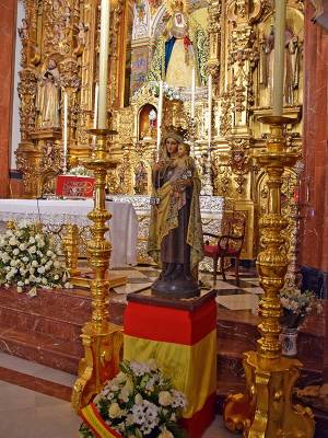 La Comandancia Naval de Sevilla honra a la Virgen del Carmen con una solemne Eucaristía en la Capilla de los Marineros 